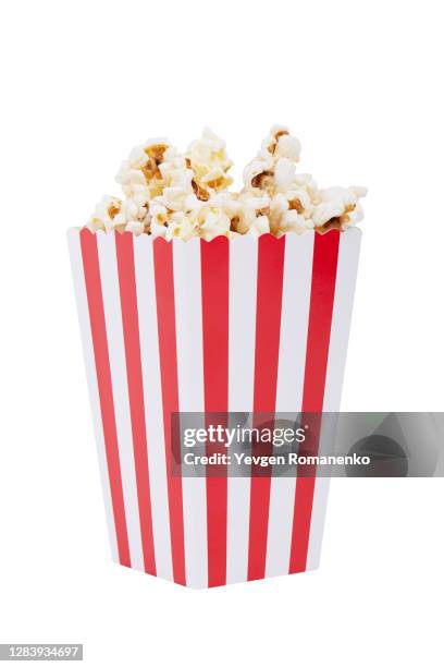 paper striped bucket with popcorn isolated on white background with clipping path. - pop corn fotografías e imágenes de stock