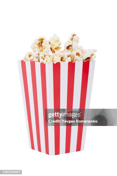 paper striped bucket with popcorn isolated on white background with clipping path. - popcorn box stock pictures, royalty-free photos & images
