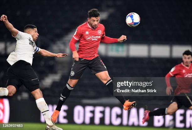 Macauley Bonne of Queens Park Rangers scores his sides first goal during the Sky Bet Championship match between Derby County and Queens Park Rangers...