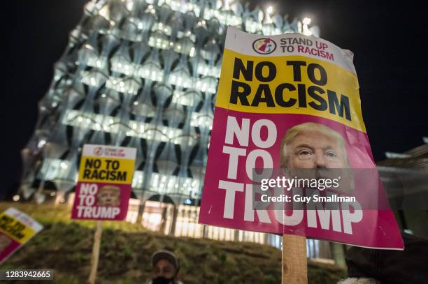 Demonstrators from 'Stand Up To Racism' hold a protest outside the US Embassy in Vauxhall, demanding that Donald Trump concedes defeat and leaves...