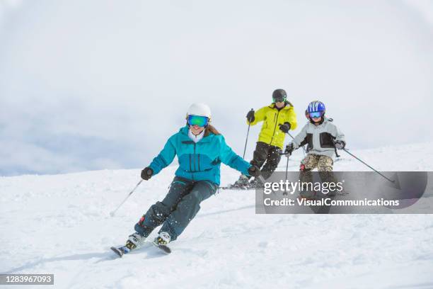 family on ski vacation in whistler, bc, canada. - ski slope imagens e fotografias de stock