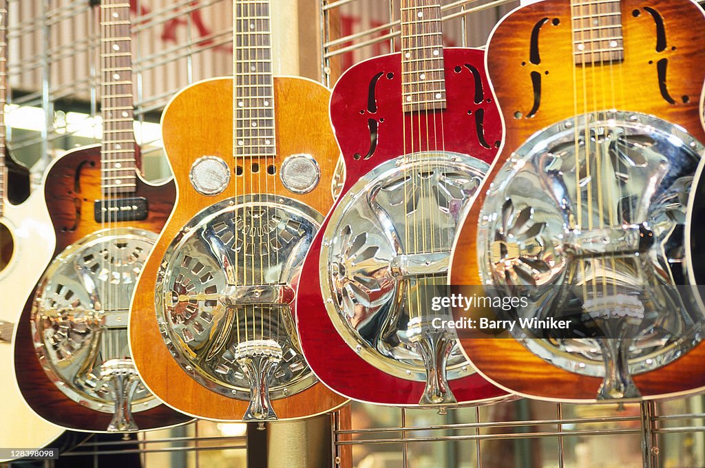 Showcase displaying Dobro resonating guitars