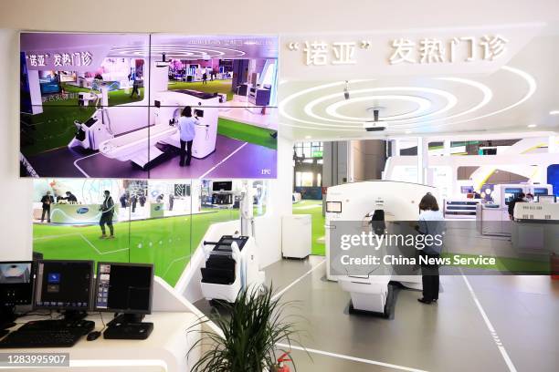 Revolution CT scanner is on display at the stand of General Electric Healthcare during the 3rd China International Import Expo at the National...