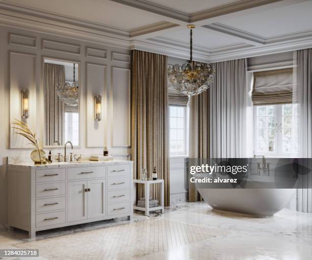 eigentijds interieur van een luxe badkamer - badkamer huis stockfoto's en -beelden