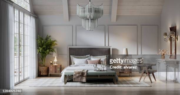 beautiful bedroom in a luxurious cottage house - area rug stock pictures, royalty-free photos & images
