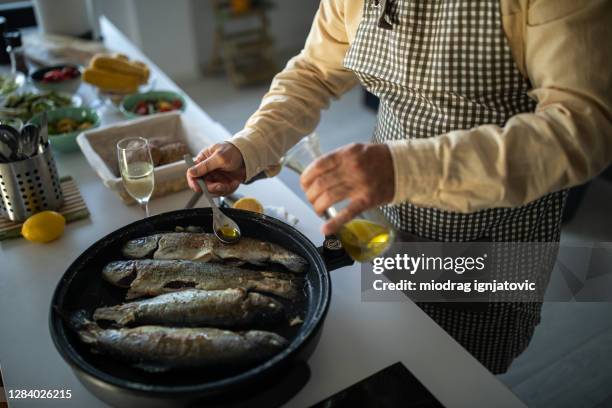 Man Frying Fish 472 Man Frying Fish Stock Photos, High-Res Pictures, and Images - Getty ...
