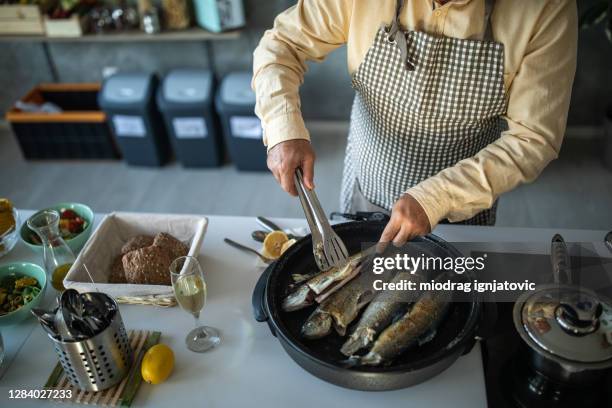 Man Frying Fish 468 Man Frying Fish Stock Photos, High-Res Pictures, and Images - Getty ...