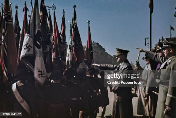 German Chancellor Adolf Hitler along with senior Nazi Party military chiefs Reichsmarschall Herman Goering , Admiral Karl Doenitz and Reichsfuhrer...