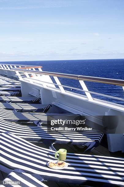 coffee and pasties atop deck chair - cruise liner ストックフォトと画像