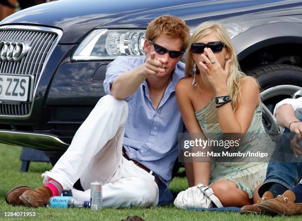 Prince Harry and Chelsy Davy attend the Cartier International Polo Match at Guards Polo Club, Smith's Lawn on July 30, 2006 in Egham, England.