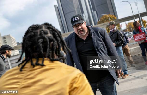 Supporters of President Donald Trump argue with a counter protester on November 05, 2020 in Detroit, Michigan. Two days after the U.S. National...