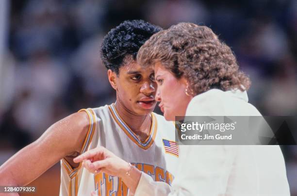 Dena Head, Guard for the Tennessee Lady Volunteers listens to instructions from Head Coach Pat Summitt during the NCAA Division I Women's Basketball...