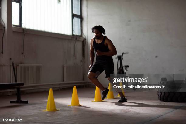 working on his footwork - warm up exercise indoor stock pictures, royalty-free photos & images