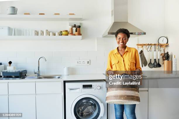 because we'd go crazy without clean clothes! - laundry africa stock pictures, royalty-free photos & images
