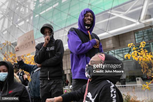 Anti-Trump protesters laugh at Trump supporters across the street on November 05, 2020 in Detroit, Michigan. Two days after the U.S. Presidential...
