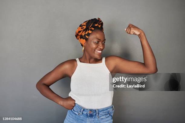 there's no force equal to a woman determined to rise - head tie stock pictures, royalty-free photos & images