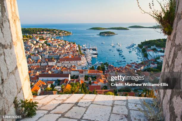 Panoramic photo of Hvar Town at sunset taken from the Spanish Fort, Tvrdava Spanjola, Hvar Island, Croatia.