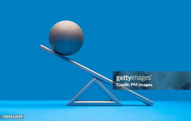 ball on scale - minimal effort stock pictures, royalty-free photos & images