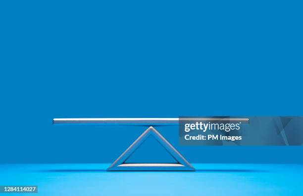 seesaw weight scale - balance stock pictures, royalty-free photos & images