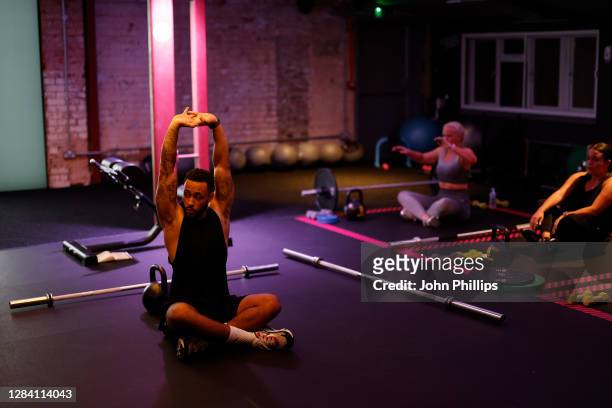 Trainer Connor Clachar takes part in a Kobox workout at KOBOX Chelsea on October 22, 2020 in London, England. KOBOX offers 50-minute combination...
