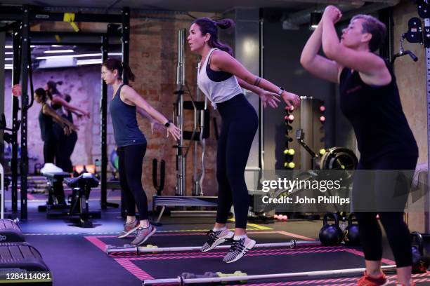 Participants take part in a Kobox workout at KOBOX Chelsea on October 22, 2020 in London, England. KOBOX offers 50-minute combination workouts which...