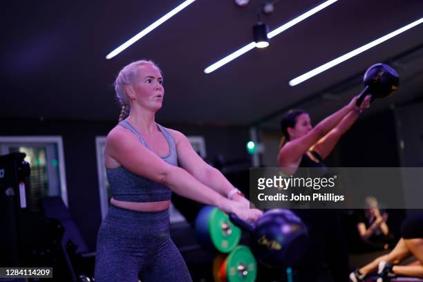 Participants take part in a Kobox workout at KOBOX Chelsea on October 22, 2020 in London, England. KOBOX offers 50-minute combination workouts which...