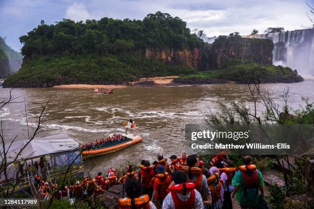 Boat ride under the waterfalls at Iguazu Falls, aka Iguassu Falls or Cataratas del Iguazu, Misiones Province, Argentina, South America.