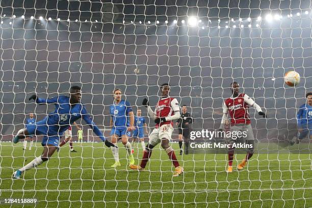 Sheriff Sinyan of Molde FK scores an own goal, Arsenal's second goal during the UEFA Europa League Group B stage match between Arsenal FC and Molde...