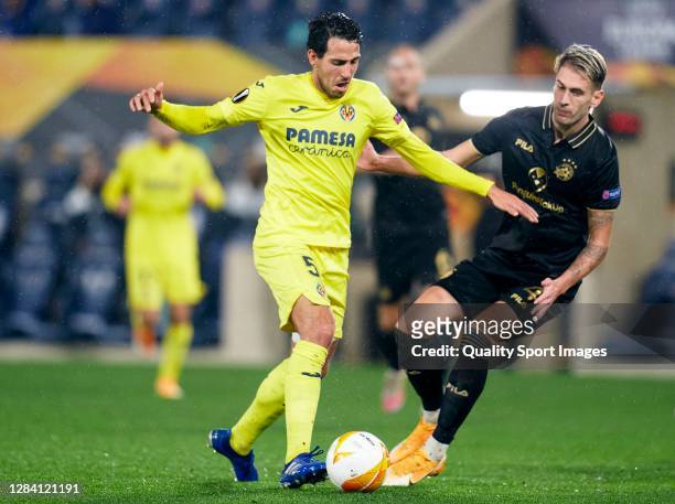 Dani Parejo of Villarreal competes for the ball with Eden Karzev of Maccabi Tel-Aviv during the UEFA Europa League Group I stage match between...