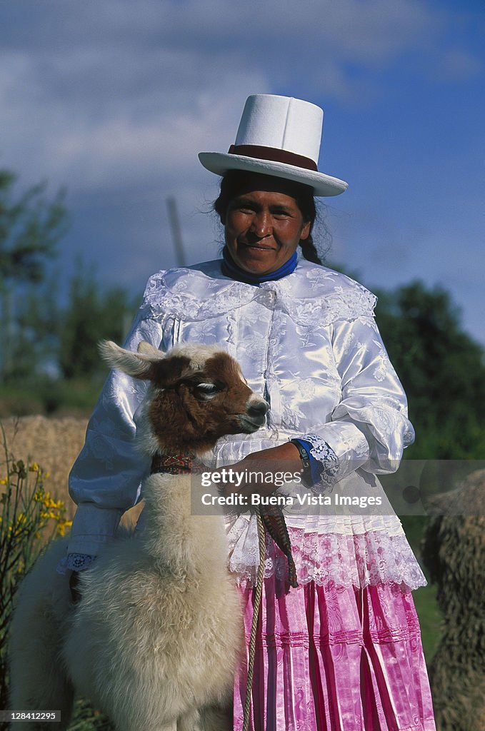 Quechua woman w/ llama, sacsayhuaman, cuzco