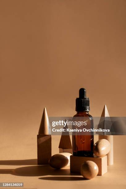 composition with bottles of essential oils on table. natural cosmetics - antiseptic cream stock pictures, royalty-free photos & images