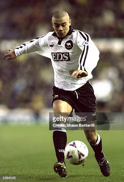 Deon Burton of Derby County shapes to shoot in the FA Carling Premiership match against Everton at Pride Park in Derby, England. Derby won 2-1. \...