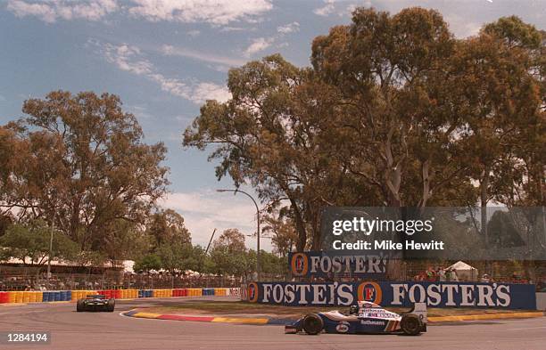 S DAMON HILL CHASES THE BENETTON OF MICHAEL SCHUMACHER PAST THE GUM TREES DURING THE AUSTRALIAN GRAND PRIX AT ADELAIDE. Mandatory Credit: Mike...