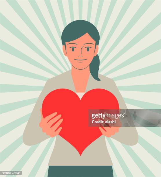 beautiful young woman holding a love heart - love emotion stock illustrations