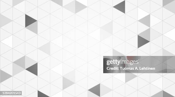 graphic and geometric pattern of gray triangles. - dreieck stock-fotos und bilder