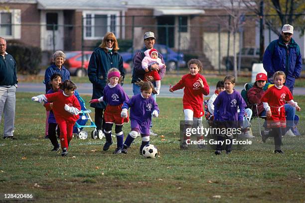 young girls playing soccer - parents watching kids bildbanksfoton och bilder