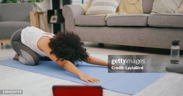 login anywhere and workout anywhere - childs pose stock pictures, royalty-free photos & images