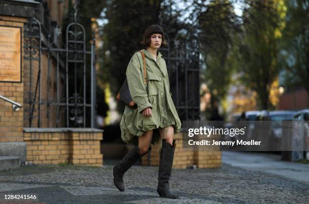 Lea Naumann wearing Zalando boots, Jacquemus coat and Louis Vuitton bag on November 05, 2020 in Berlin, Germany.