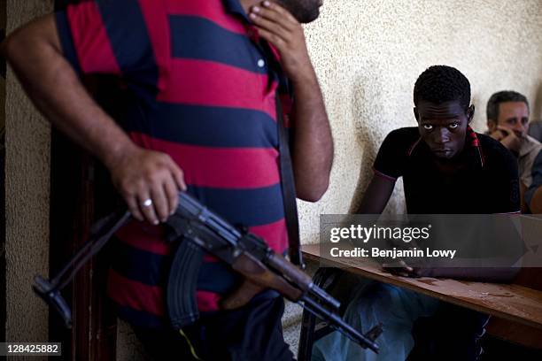 Approximately 150 suspected Gaddafi loyalist soldiers are held captive in an elementary school on August 28 2011 in Tripoli, Libya.