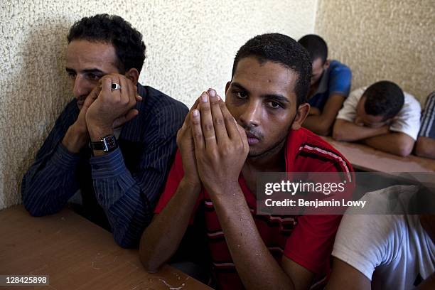 Approximately 150 suspected Gaddafi loyalist soldiers are held captive in an elementary school on August 28 2011 in Tripoli, Libya.