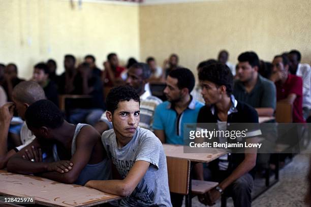 Approximately 150 suspected Gaddafi loyalist soldiers are held captive in an elementary school on August 28 2011 in Tripoli, Libya.