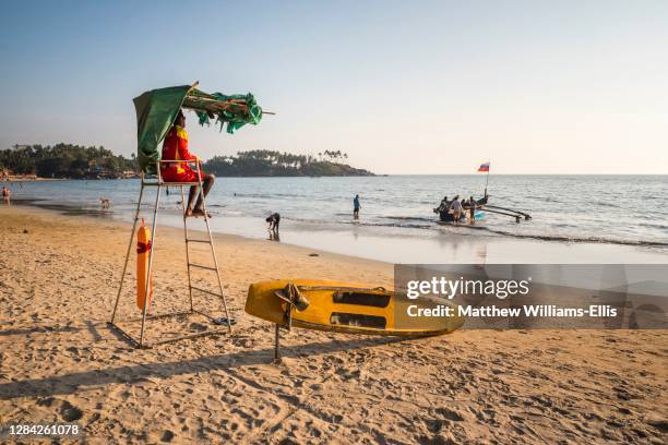 Lifeguard life saving coastguard station on tropical Palolem Beach, a popular surfing spot on the Goa coast, India.