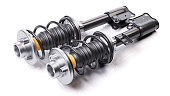 Pair of car shock absorbers with springs. Suspension components.