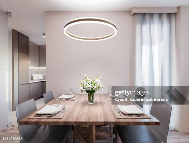 modern apartment dining room - hanging lights stock pictures, royalty-free photos & images