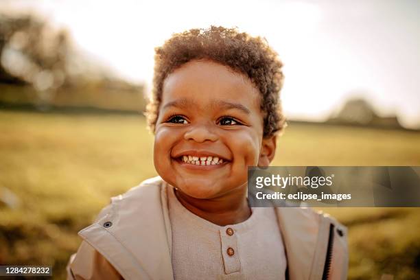 portrait of happy child - pure joy stock pictures, royalty-free photos & images