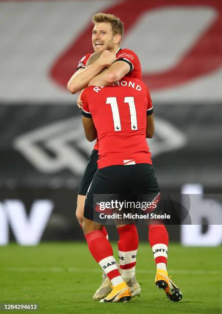 Stuart Armstrong of Southampton celebrates with teammate Nathan Redmond after scoring his team's second goal during the Premier League match between...