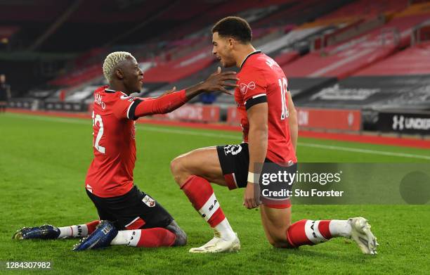 Southampton player Che Adams celebrates his opening goal with Moussa Djenepo during the Premier League match between Southampton and Newcastle United...