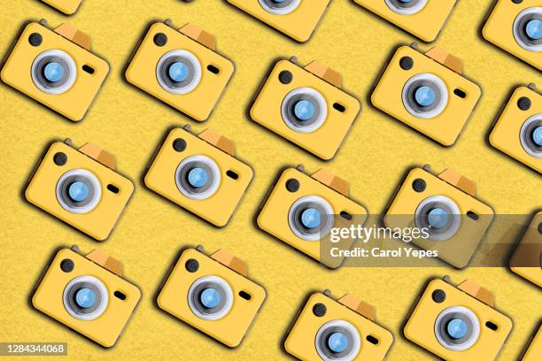 yellow vintage  camera pattern - close to camera stock pictures, royalty-free photos & images