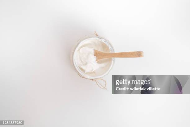 healthy breakfast with fresh greek yogurt on background. - greek yogurt stock pictures, royalty-free photos & images