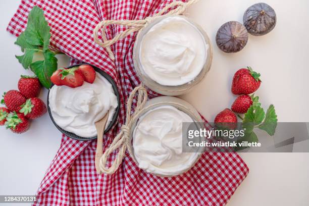 healthy breakfast with fresh greek yogurt on background. - probiotic stock pictures, royalty-free photos & images